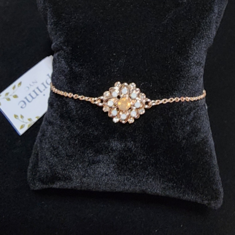 Elegant Gold and White Bracelet
